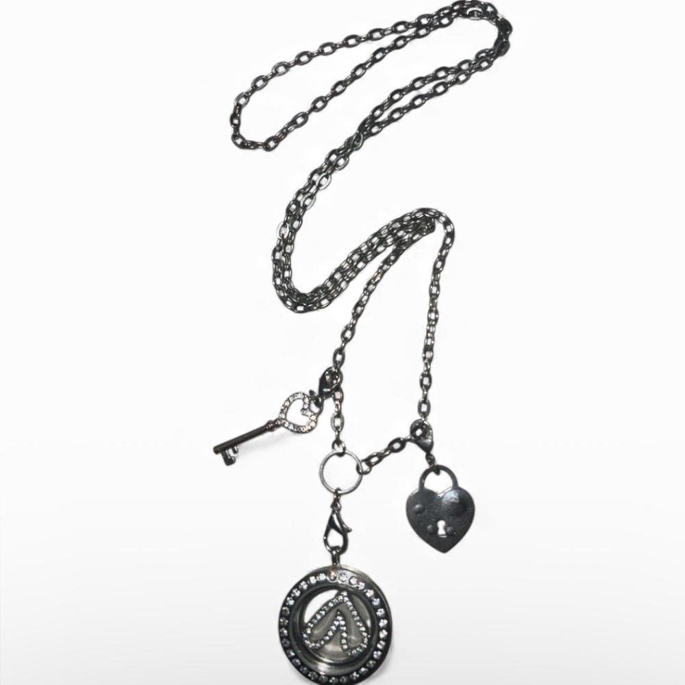 Silver long Necklace Heart Moves charm/Key, heart unlock hanging off Necklace